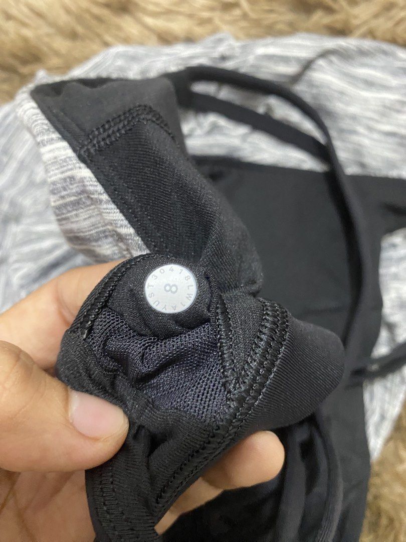 Lululemon Gray Space Dye Tank Top Size 8 (Category: Sleeveless) located in Cagayan de Oro. Submitted by sepamorash53558 (Listing ID 1468200212, Image 3). Description: - Brand: Lululemon - Style: Workout tank top with built-in black sports bra and strappy back - Color/Pattern: Gray space dye - Size: 8 (tag in inner pocket) - Features: Reflective logo on lower left hem, highly breathable - Ideal for: Yoga, gym sessions, running, and casual wear.