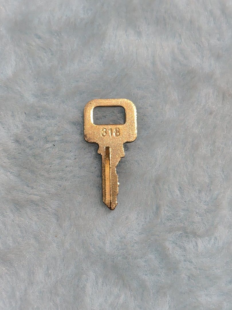 LV BRASS KEY Code 318 (Category: Microphones) located in Mandaue City. Submitted by chuchi152615 (Listing ID 1468134301, Image 1). Description: - Vintage solid brass key stamped with number 318 on the head - Features a rectangular top hole for easy ring attachment - Single-sided cut blade with a central groove design - Standard size ideal for small padlocks, lockers, or vintage cabinets - Durable and heavy-duty metal construction.