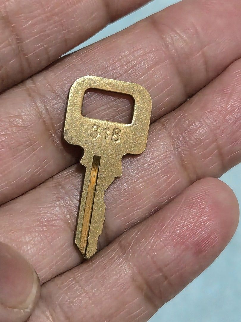 LV BRASS KEY Code 318 (Category: Microphones) located in Mandaue City. Submitted by chuchi152615 (Listing ID 1468134301, Image 3). Description: - Vintage solid brass key stamped with number 318 on the head - Features a rectangular top hole for easy ring attachment - Single-sided cut blade with a central groove design - Standard size ideal for small padlocks, lockers, or vintage cabinets - Durable and heavy-duty metal construction.