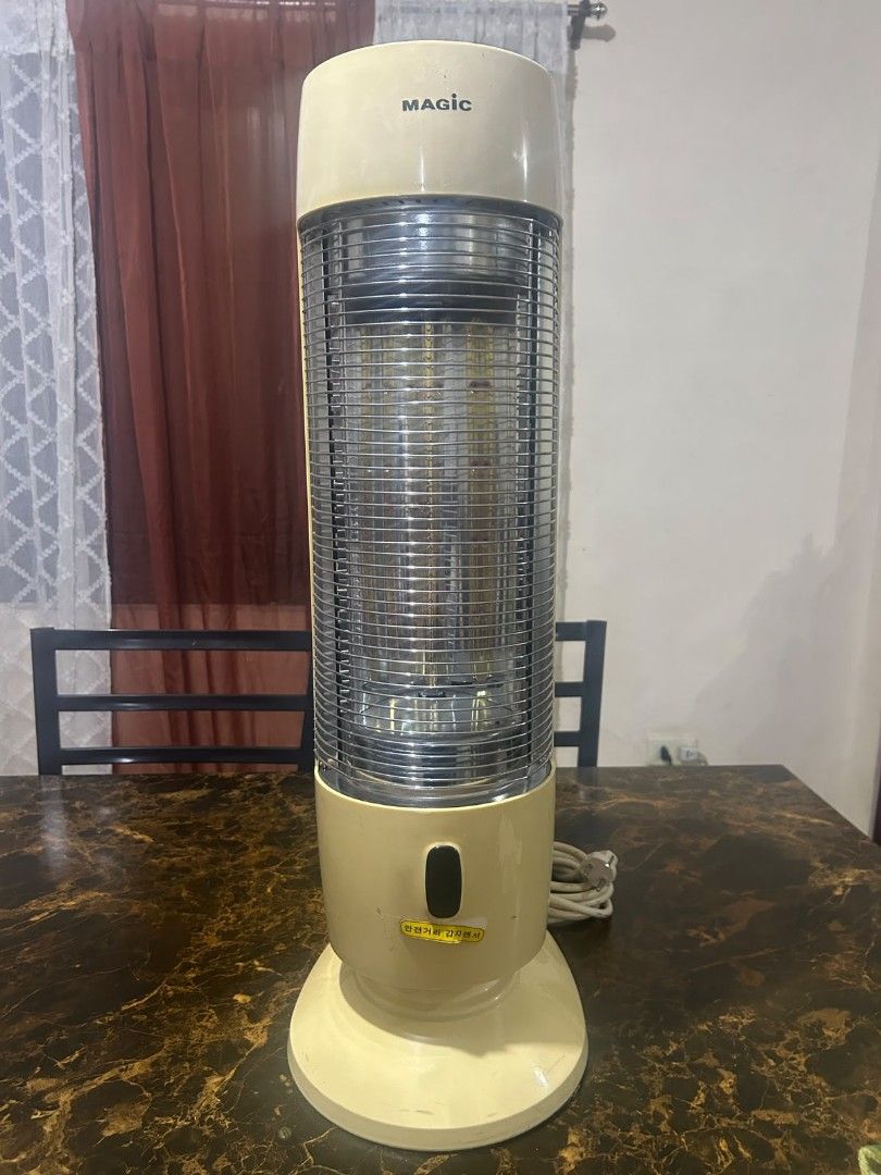 MAGIC electric heater (Category: Electrical, Adaptors & Sockets) located in Taguig. Submitted by lhadychinitah (Listing ID 1468255528, Image 1). Description: Heating Element: Utilizes carbon tubes to provide rapid infrared heat. Design: Features a tall, slim tower design with a protective metal grill. Features: Often includes oscillation for even heat distribution. Safety Features: Includes tip-over protection to shut off the unit if it is knocke