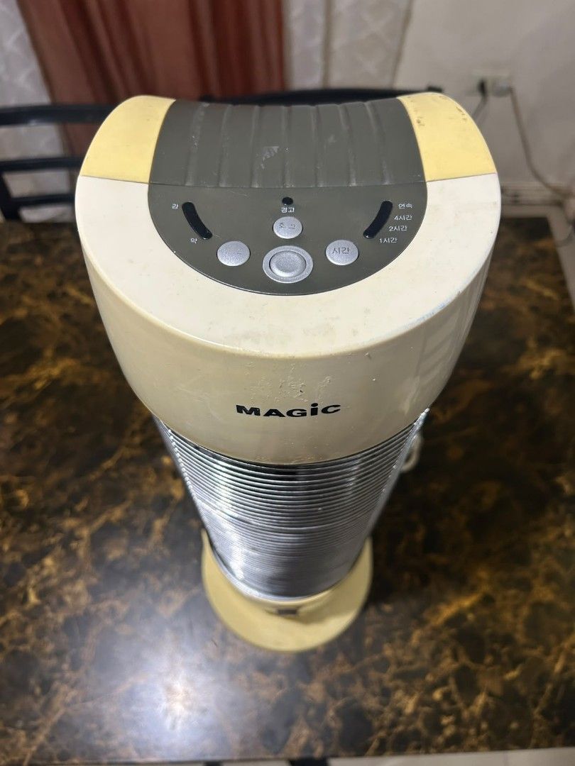 MAGIC electric heater (Category: Electrical, Adaptors & Sockets) located in Taguig. Submitted by lhadychinitah (Listing ID 1468255528, Image 3). Description: Heating Element: Utilizes carbon tubes to provide rapid infrared heat. Design: Features a tall, slim tower design with a protective metal grill. Features: Often includes oscillation for even heat distribution. Safety Features: Includes tip-over protection to shut off the unit if it is knocke