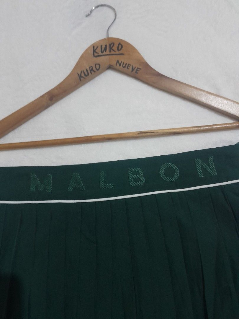 Malbon golf skirt (Category: Skirts) located in Lucena. Submitted by kuronueve0909 (Listing ID 1468217873, Image 3). Description: Malbon hunter Green pleated golf skirt Size: large Waistline: 30 Length: 15.5 Price: ₱2,500 No issue ✅️ Ready to wear ✅️.