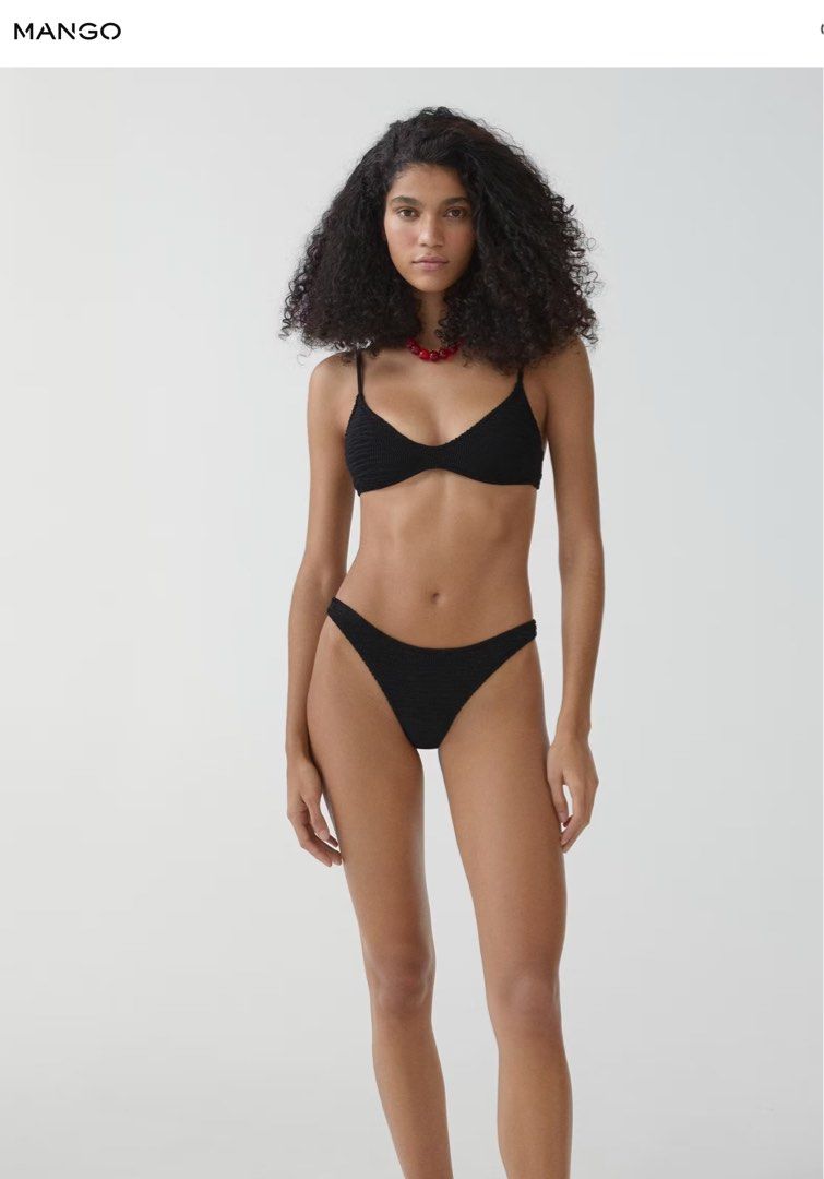 Mango Black Crinkle Bikini Top (Category: Bikinis & Swimsuits) located in Quezon City. Submitted by declutter.chek (Listing ID 1468137450, Image 1). Description: - Brand: Mango - Size: XS - NO PADS - RFS: Never used. Impulse buy. Haven’t gone to the beach in 2 years haha - Color: Black - Material: Stylish crinkle textured fabric - Features: Adjustable thin shoulder straps and secure back hook closure .