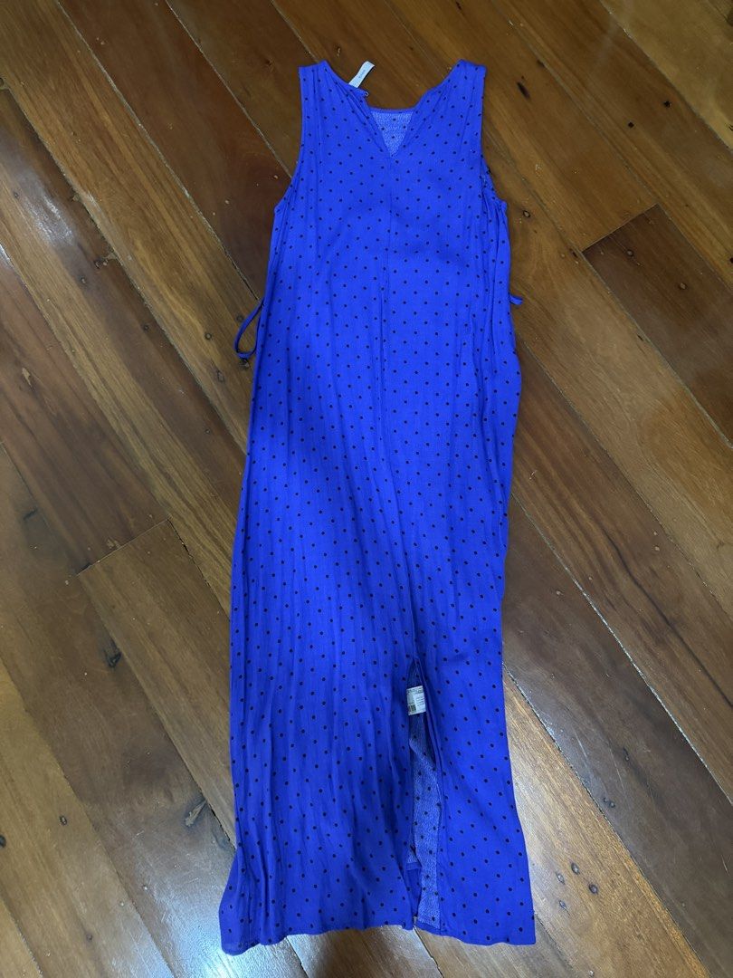 Mango Blue Polka Dot Maxi Dress Size XS (Category: Dresses) located in Manila. Submitted by matchalover2024 (Listing ID 1468098440, Image 3). Description: - Brand: Mango - Style: Sleeveless midi dress with round neckline and back button closure + back slit - Pattern: Blue with all-over black polka dots - Size: EU XS / USA XS / MEX CH - Material: Lightweight fabric, ideal for warm weather and casual outings - Made in: Cambodia -worn once -RFS: Dec