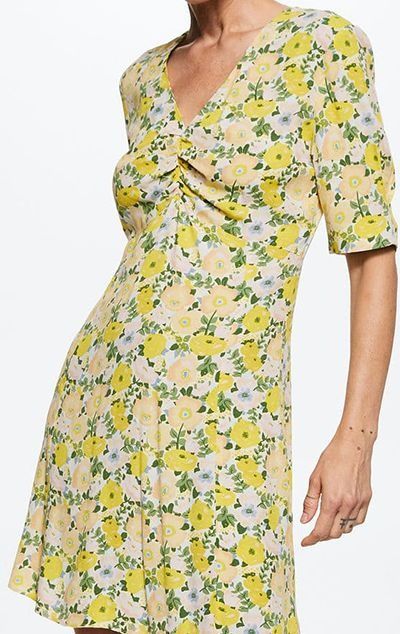 Mango Floral V-Neck A-Line Dress (Category: Dresses) located in Makati City. Submitted by gobernice (Listing ID 1468117401, Image 1). Description: - Brand: Mango - Style: Off White & Yellow floral print dress with V-neckline and ruched front detail - Size: EUR XS / USA 2 - Features: Short sleeves, concealed side zipper, lightweight fabric - Condition: Used once, clean and well maintained - Perfect for: Casual days out, weekend brunches, and sunny