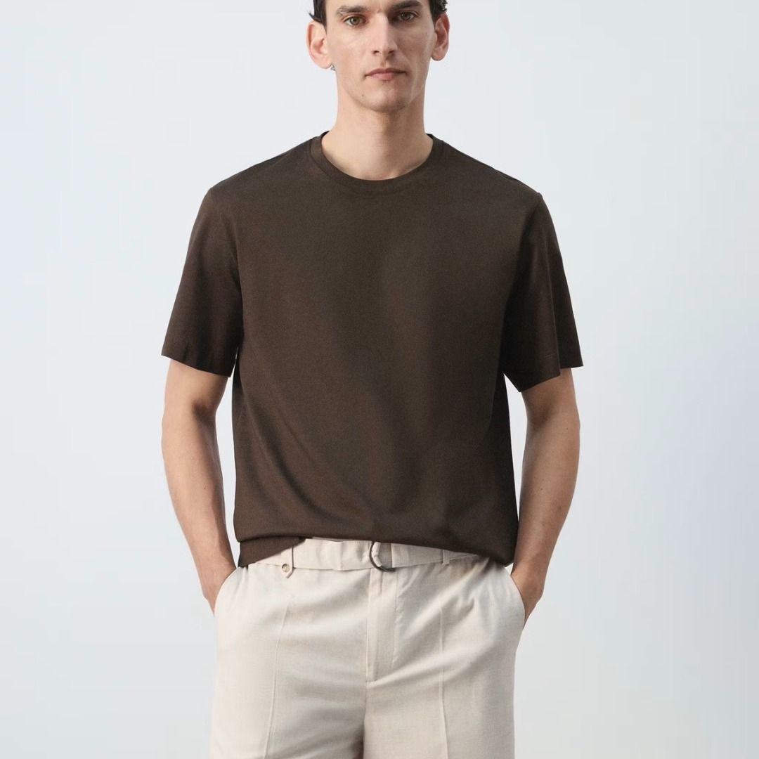 Mango Man Regular Fit Brown T-Shirt (Category: Tshirts & Polo Shirts ) located in Cebu City. Submitted by hommeboy.howard (Listing ID 1468242734, Image 2). Description: - Brand: Mango Man - Color: Dark brown - Neckline: Crew neck with ribbed collar - Fit: Standard fit - Style: Simple daily basic top - Condition: Lightly Used Loc: Cebu City Shipping fee c/o buyer.