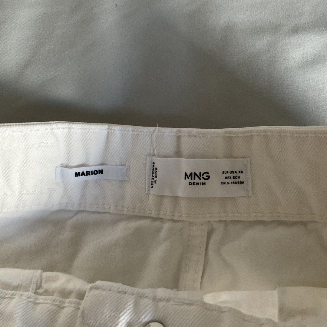 Mango White Denim Skirt (Category: Skirts) located in Quezon City. Submitted by declutter.chek (Listing ID 1468154042, Image 2). Description: Fits W24 Thick excellent quality With small stain on pocket see pic.