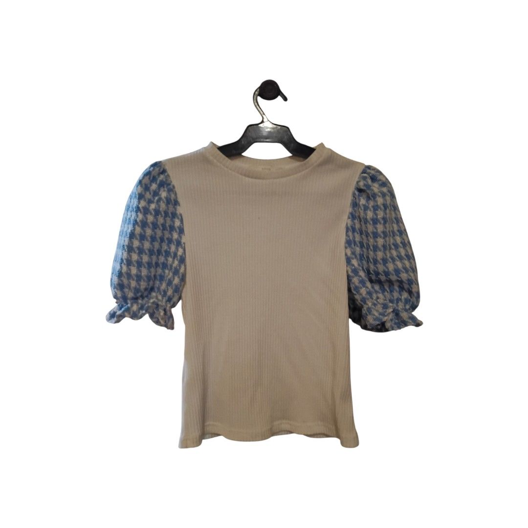 Mango White w/ Blue Houndstooth Puff Sleeves (Category: Others Tops) located in Quezon City. Submitted by pochac (Listing ID 1468125560, Image 1). Description: This top features a white ribbed body and contrasting blue hounsdtooth puff sleeves plus a round neckline..