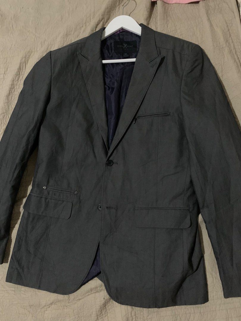Marc Ecko Charcoal Grey Blazer Jacket (Category: Coats, Jackets and Outerwear) located in Manila. Submitted by spaceshop12345 (Listing ID 1468179087, Image 2). Description: - Brand: Marc Ecko - Color: Charcoal Grey with Dark Purple inner lining - Size: Medium - Style: Casual blazer / jacket - Closure: Two-button front - Pockets: Front flap pockets and zipped chest pocket detail - Condition: Great for dressing up or keeping sharp.