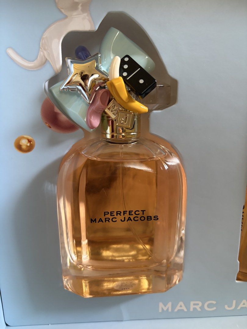 Marc Jacobs Perfect Eau de Parfum Gift Set (Category: Fragrance & Deodorants) located in Taguig. Submitted by _abbyscloset_ (Listing ID 1468062551, Image 3). Description: - Brand new, 100% authentic Marc Jacobs Perfect gift set - Includes full-size 100ml Eau de Parfum spray - Includes travel-size spray (10ml) - Includes hydrating 75ml body lotion - Comes in original light blue presentation box with playful cap charms - All items are completely un