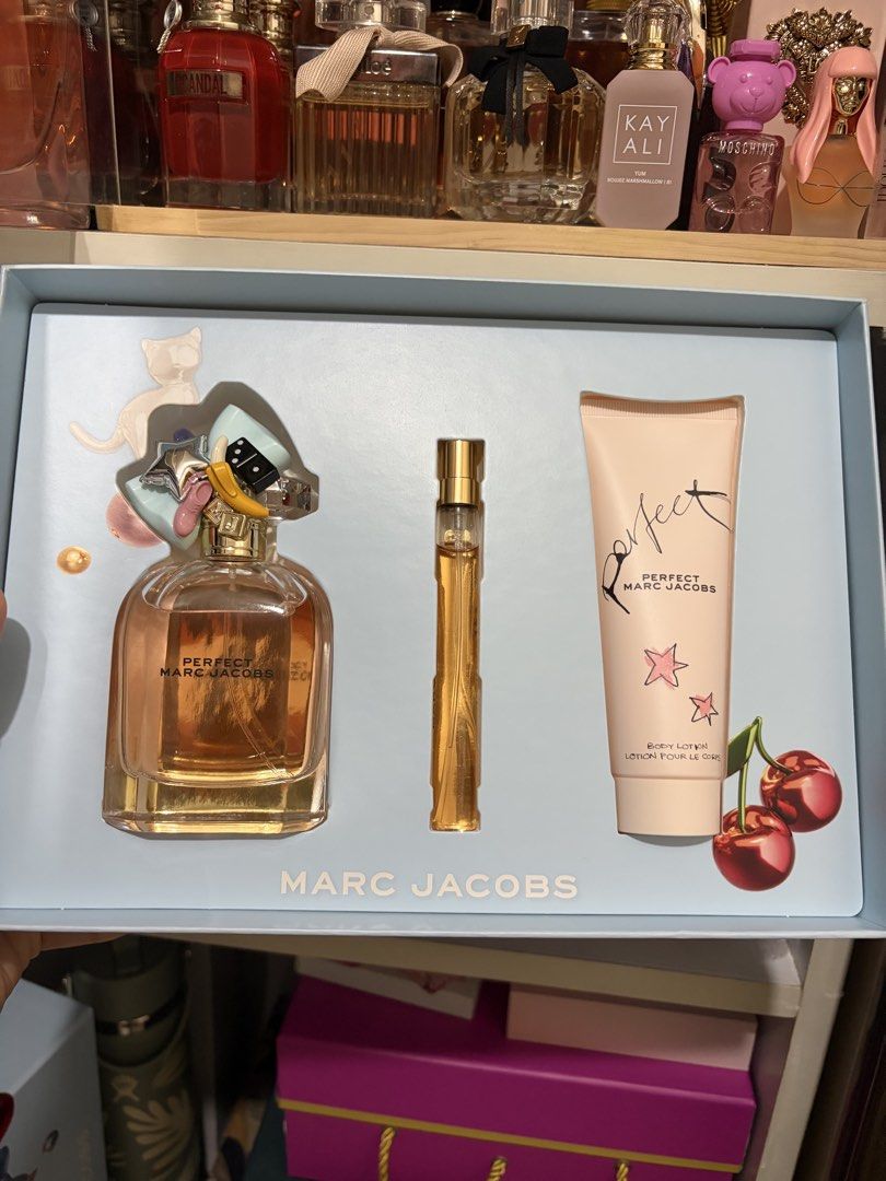 Marc Jacobs Perfect Eau de Parfum Gift Set (Category: Fragrance & Deodorants) located in Taguig. Submitted by _abbyscloset_ (Listing ID 1468062551, Image 1). Description: - Brand new, 100% authentic Marc Jacobs Perfect gift set - Includes full-size 100ml Eau de Parfum spray - Includes travel-size spray (10ml) - Includes hydrating 75ml body lotion - Comes in original light blue presentation box with playful cap charms - All items are completely un