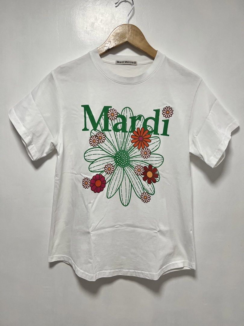 Mardi Mercredi "Flower Blossom" Tee (Category: Shirts) located in Muntinlupa City. Submitted by thriftdripbyjm (Listing ID 1468216346, Image 1). Description: Color rate: 10/10 Dimes: 18.5x25 (S-M) Sleev: 6 Issue: minimal fade on print Price: 850 + sf .