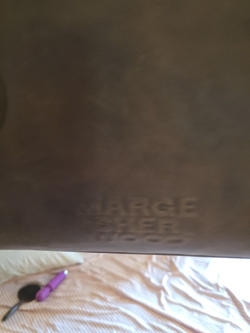 Marge Sherwood Boston Taupe (Category: Shoulder Bags) located in Taguig. Submitted by variegatedmuseph (Listing ID 1468138052, Image 2). Description: - Brand: Marge Sherwood (Authentic) - Color: Dark Brown - Design: Structured rectangular shape with subtle vertical embossed logo - Straps: Long twin shoulder straps for comfortable wear - Closure: Secure zip top closure running along the side - Usage: Spacious and stylish, perfect for daily carry R