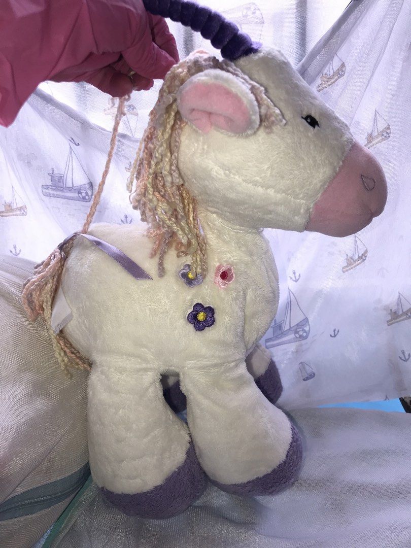 Marks & Spencer Floppy Unicorn Braids (Category: Plushies & Soft Toys) located in Manila. Submitted by freecat.21c0ee (Listing ID 1468098462, Image 2). Description: Marks & Spencer Floppy Unicorn with flowers & braids soft toy plush.