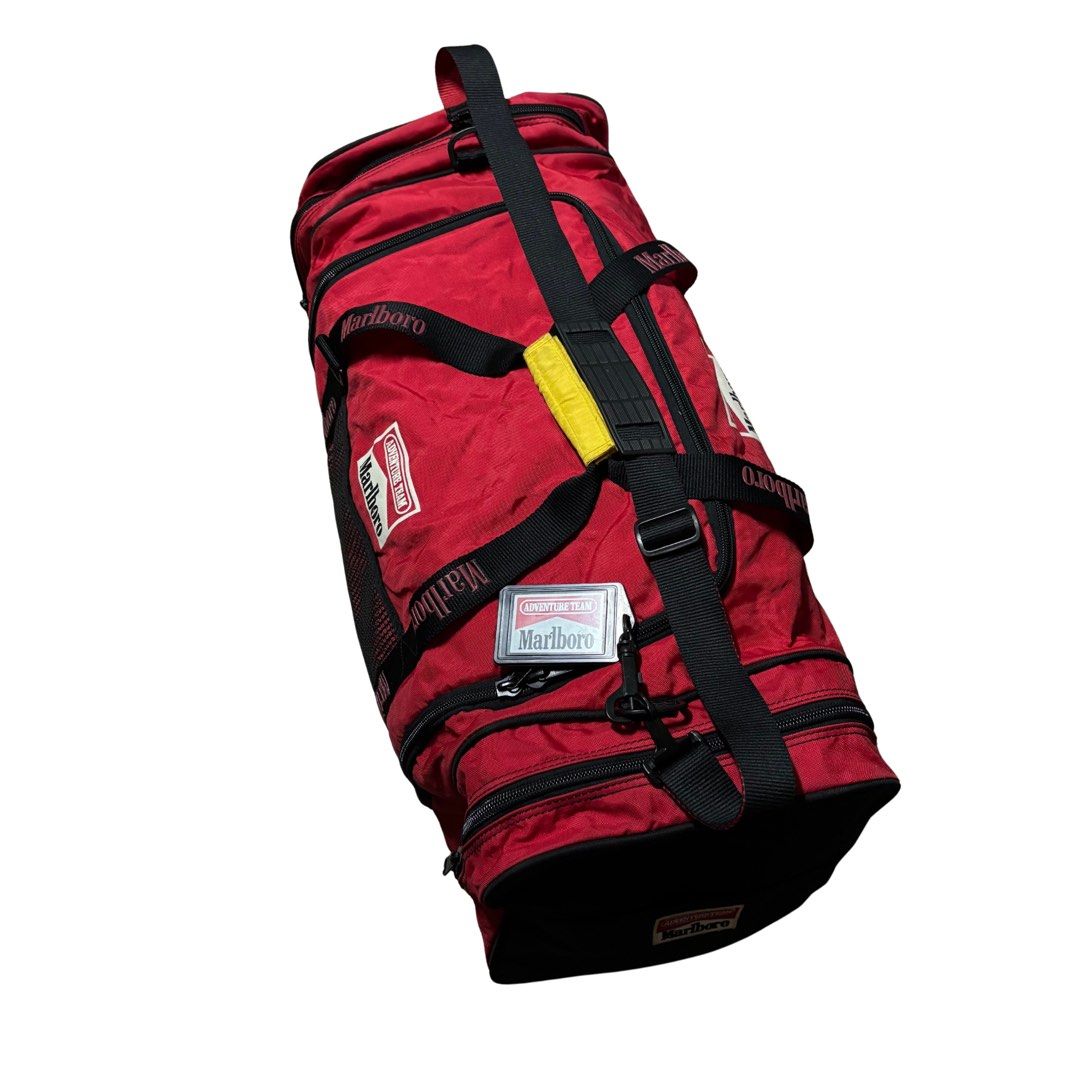 Marlboro Duffle Bag (Category: Sling Bags) located in Muntinlupa City. Submitted by rtyfck (Listing ID 1468217751, Image 2). Description: Marlboro Duffle Bag Details : •Width : 29 •Length : 14 •Size : OS •Issue : sign of usage , stains , need wash •Condition : Very Worn •Mine : ₱ •Steal : ₱ •Grab : ₱ (AUTOMATICALLY YOURS) +SF Mine/M + ♈️(any emoji) Example : MINE♈️ / M♈️ (STEAL & GRAB OPTION WILL BE END 10:00 AM TOMORROW).