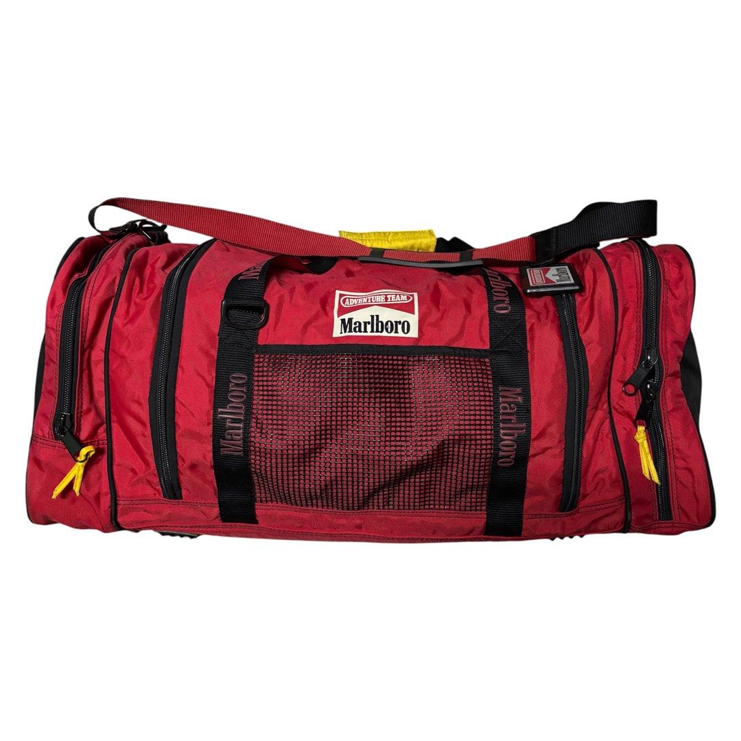 Marlboro Duffle Bag (Category: Sling Bags) located in Muntinlupa City. Submitted by rtyfck (Listing ID 1468217751, Image 1). Description: Marlboro Duffle Bag Details : •Width : 29 •Length : 14 •Size : OS •Issue : sign of usage , stains , need wash •Condition : Very Worn •Mine : ₱ •Steal : ₱ •Grab : ₱ (AUTOMATICALLY YOURS) +SF Mine/M + ♈️(any emoji) Example : MINE♈️ / M♈️ (STEAL & GRAB OPTION WILL BE END 10:00 AM TOMORROW).