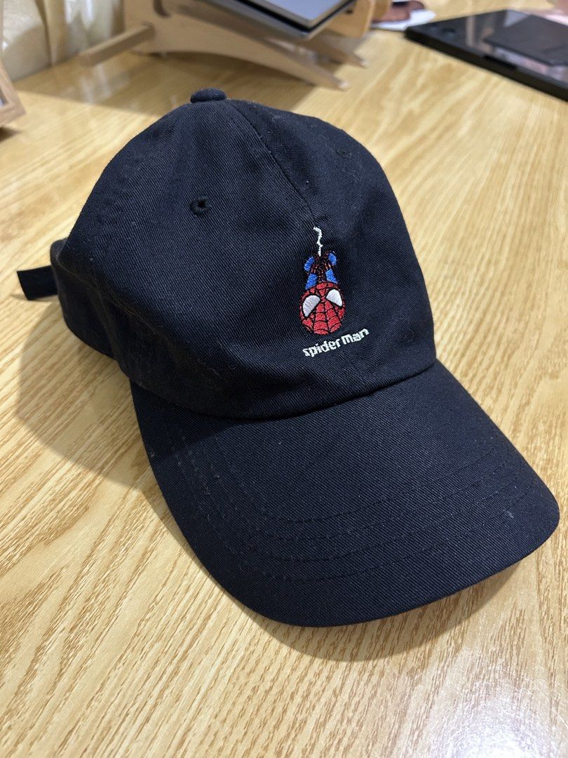 Marvel Cap Spider-Man Black CapiO Cap (Category: Caps & Hats) located in Calbayog City. Submitted by thrift.bucks101 (Listing ID 1468175505, Image 2). Description: - Official Marvel Spider-Man cap by CapiO in classic black - Features embroidered Spider-Man graphic on the front with text - Red Marvel logo patch on the side - Adjustable strapback closure with branded metal buckle - Size: 58cm (based on inner tag) - Made of clean, high-quality cotto