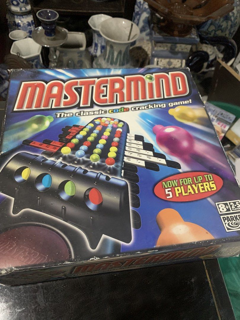 Mastermind The Classic Code Cracking Game Parker 2-5 Players (Category: Board Games & Puzzles) located in Quezon City. Submitted by sojisup (Listing ID 1468143744, Image 3). Description: - Classic Parker Mastermind code-cracking board game - Updated version for up to 5 players - Includes rotating game unit, code-setting unit, coloured pegs, peg cover, and instructions - Perfect strategy game for family game nights - Condition: Box shows minor she