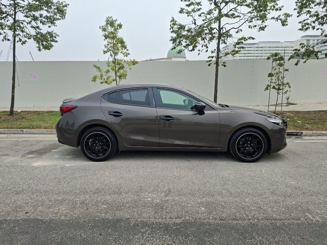 Mazda 3 Sedan 1.5A Deluxe Sunroof Auto (Category: Used Cars) located in Singapore. Submitted by preciseauto (Listing ID 1468093046, Image 2). Description: 🔥🔥BOSS SAY ALL MUST GO CLEARANCE SALE🔥🔥 🚨CHEAPEST CARS IN THE MARKET🚨 🚘$500 DRIVEAWAY🚘 🏦LOWEST INTEREST FROM 1.48%🏦 🟢1 YEAR WARRANTY🟢 🔧FREE 1 YEAR SERVICING🔧 🏬 Vehicle 120 Points INSPECTION CHECK By In House Workshop BEFORE we put them for SALE 🚕 PHV Drivers Welcomed 🔁 High Tra