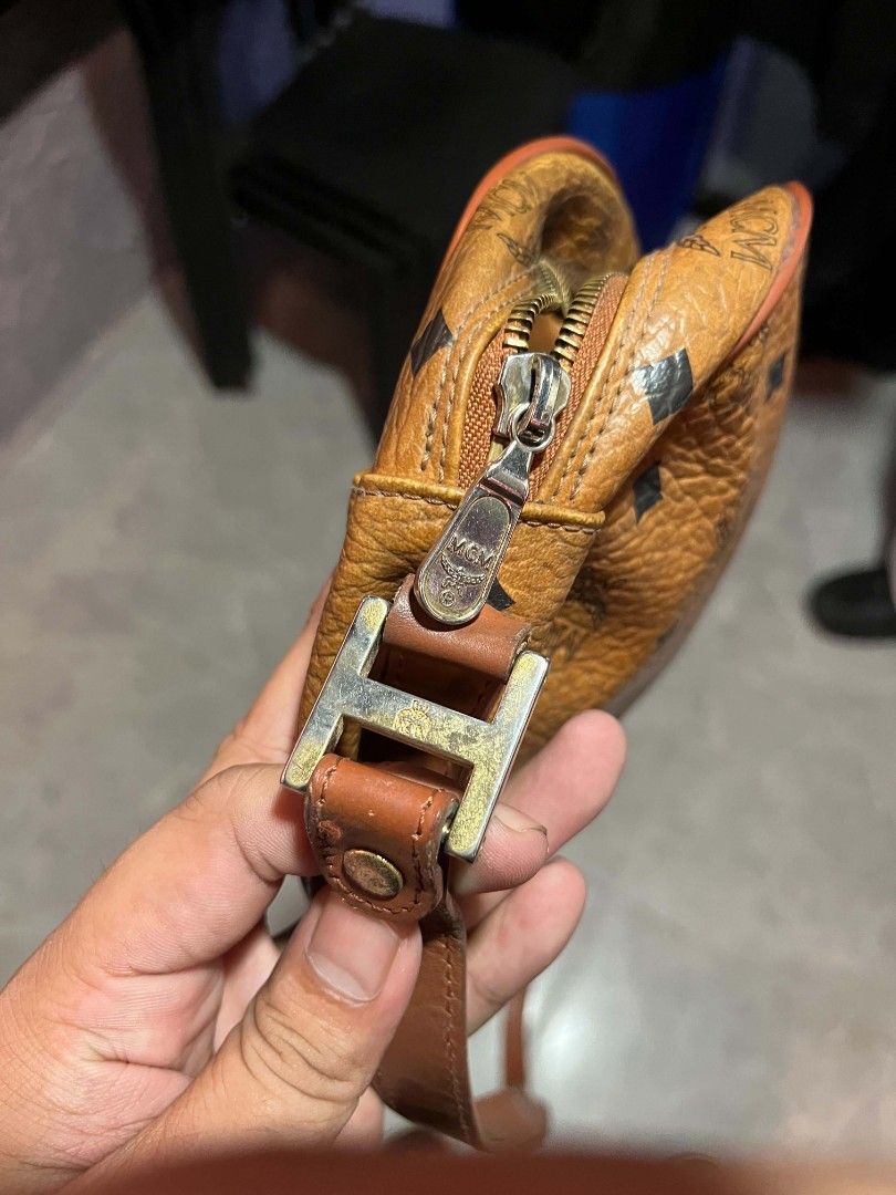 MCM monogram slingbag (Category: Purses & Pouches) located in San Fernando. Submitted by retro.district. (Listing ID 1468212623, Image 3). Description: - MCM Monogram sling bag - Condition: Excellent (Rank B) - No major issue - Authentic.