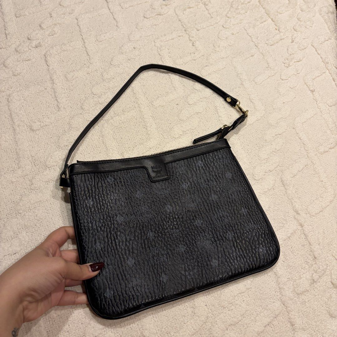 MCM Visetos Liz Shopper Tote Pouch (Category: Shoulder Bags) located in Angeles City. Submitted by astravintage (Listing ID 1468217955, Image 1). Description: Cute pouch bag, only flaw is the zipper nag hihiwalay halfway through, kayo nalang po pagawa. May white tag qr sa loob. auth not guarant..