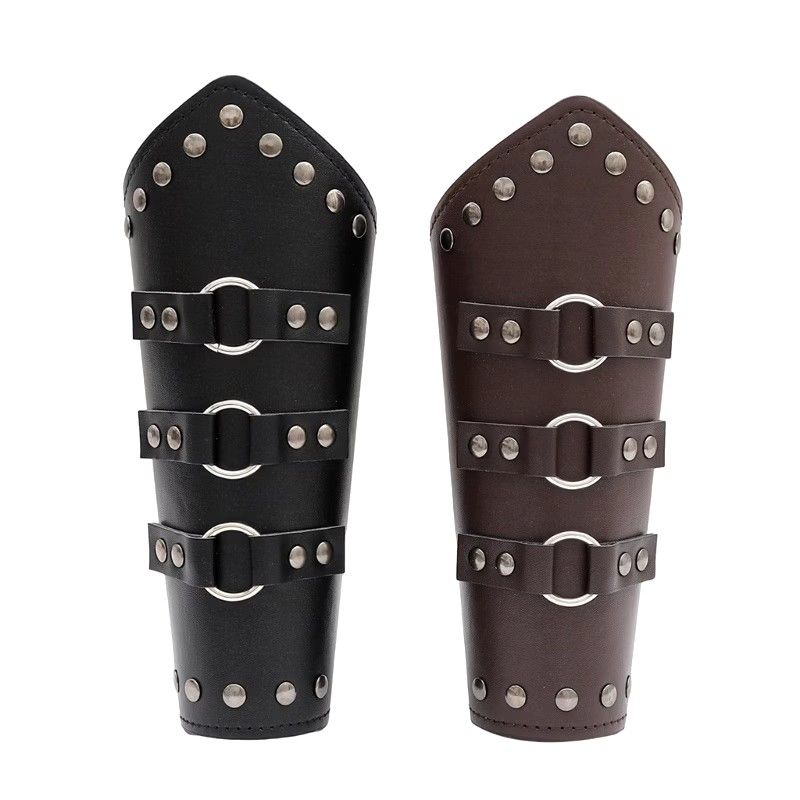 Medieval armor men (Category: Combat Sports) located in Valenzuela. Submitted by diane.35 (Listing ID 1468097396, Image 3). Description: Brown faux leather arm bracer with metal O-rings and buckle straps. Studded detailing along the edges and pointed design at one end. Includes matching brown lace cord for adjustable lacing. Great for cosplay, medieval fairs, or archery practice. Sturdy material, fits securely on the forearm..