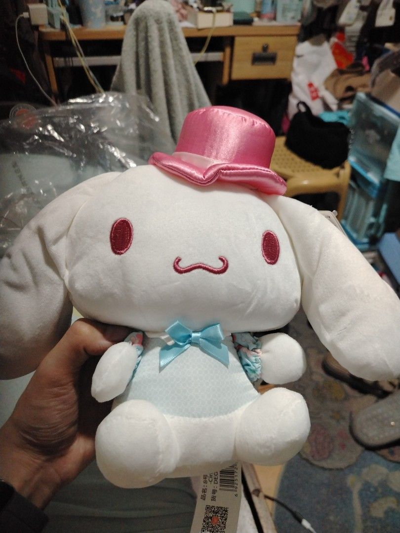Medium Sized Aoger Cinnamoroll Plushie (Category: Plushies & Soft Toys) located in Manila. Submitted by joycechua439850 (Listing ID 1468096082, Image 1). Description: -Original Brand new Medium Plushie - Collector's item, Sakura Cherry Blossom Series of 2021 -A dapper, shiny pink satin top hat paired with a matching pastel blue outfit decorated with a dainty blue ribbon bowtie and floral-patterned sakura accents on the sleeves..