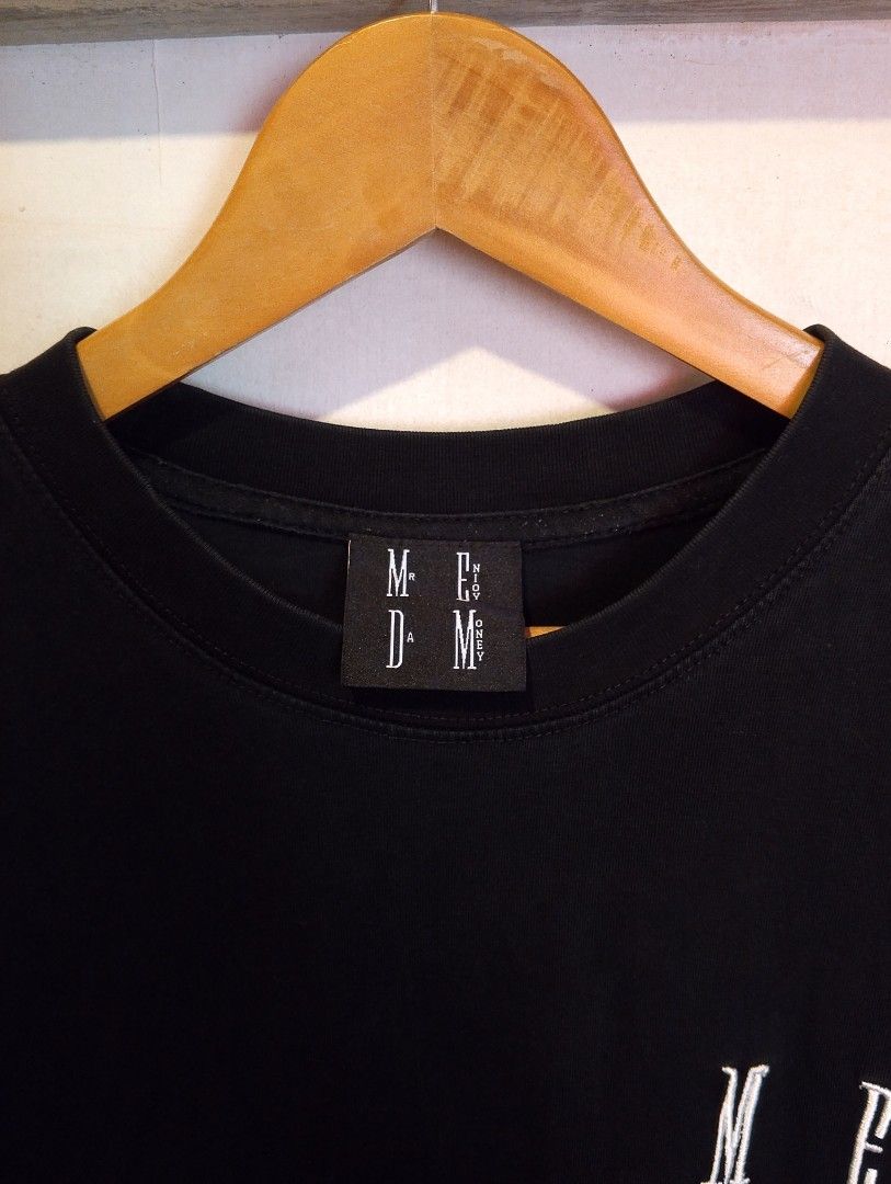 MEDM (Mr. Enjoy Da Money) Embroidered Basic T-Shirt (Category: Tshirts & Polo Shirts ) located in Orani. Submitted by thedailyarchives (Listing ID 1468067933, Image 3). Description: SOBRANG GANDA NETO SA PERSONAL MAKAPAL TELA SOLID PA PANG-PORMA!💯 HEAVYCOTTON / EMBROIDERY ‎SIZE:M-L ‎DIMES:W-22 L-28 ‎COLOR RATE:9.8/10 ‎CONDITION:EXCELLENT ‎NECKLINE:10/10 ‎NO ISSUE THIS ARE THRIFT SELECTED PRODUCTS, SO KINDLY MANAGE YOUR EXPECTATIONS THANKYOU. COL