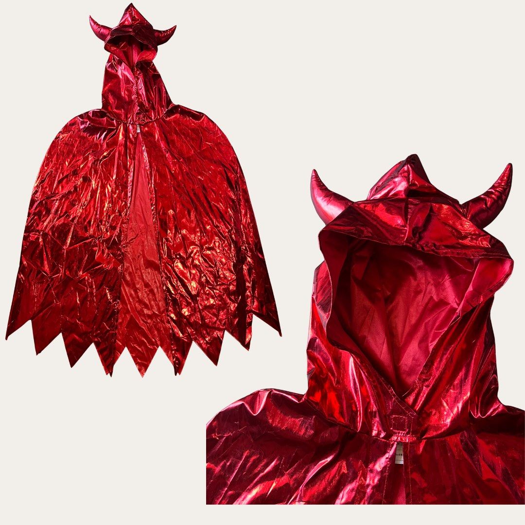 Metallic Red Hooded Devil Cape Devil Costume (Category: Coats, Jackets and Outerwear) located in Quezon City. Submitted by mjpnp (Listing ID 1468176184, Image 2). Description: Metallic Red Hooded Devil Cape Size: One size Material: 100% Polyester Condition: 10/10 (just needs ironing) 👹 one-size-fits-most cloak, has a metallic red finish and built-in padded horns on the hood 👹 perfect for Halloween.