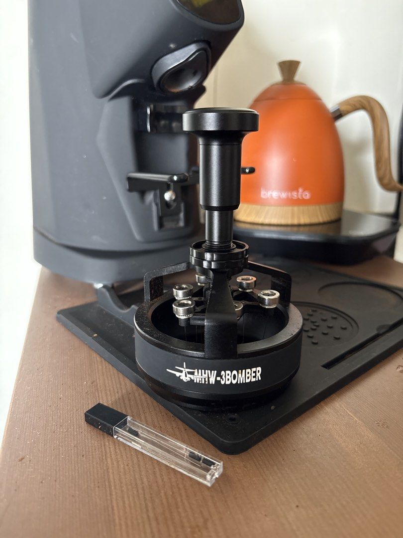 MHW-3BOMBER Coffee Needle Distributor WDT Tool (Category: Coffee Machines & Makers) located in Manila. Submitted by jacko.rodulfa (Listing ID 1468085917, Image 1). Description: - Brand: MHW-3BOMBER - Color: Matte Black - Type: Rotating espresso coffee needle distributor / WDT tool - Material: Sturdy metal build with branded ring - Feature: Smooth rotating mechanism with multiple fine needles to effectively break up coffee clumps - Handle: Ergonom