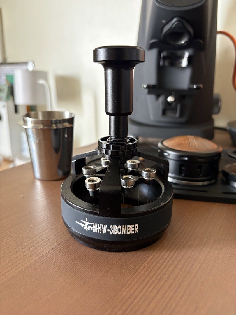 MHW-3BOMBER Coffee Needle Distributor WDT Tool (Category: Coffee Machines & Makers) located in Manila. Submitted by jacko.rodulfa (Listing ID 1468085917, Image 3). Description: - Brand: MHW-3BOMBER - Color: Matte Black - Type: Rotating espresso coffee needle distributor / WDT tool - Material: Sturdy metal build with branded ring - Feature: Smooth rotating mechanism with multiple fine needles to effectively break up coffee clumps - Handle: Ergonom