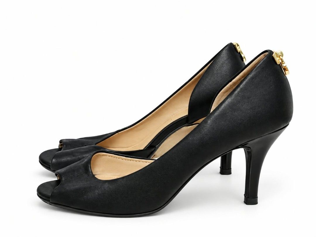 Michael Kors Black Peep-Toe Heels Size 8.5 (Category: Heels) located in Manila. Submitted by talishang_ (Listing ID 1468077804, Image 1). Description: - Brand: Michael Kors - Style: Peep-toe stiletto heels with gold padlock hardware - Color: Black with neutral lining - Size: 8.5M (US) / 39 (EU) - Condition: Very clean inside and out - Ideal for: Formal events, parties, and office wear.