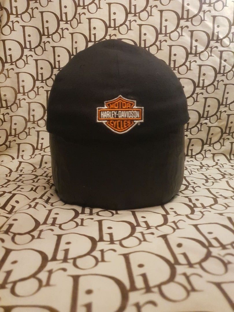 MILLER GENUINE DRAFT HARLEY DAVIDSON CAP (Category: Caps & Hats) located in San Fernando. Submitted by _jaximus (Listing ID 1468216384, Image 3). Description: - Color: Classic Black - Design: Embroidered Miller Genuine Draft logo on front, Harley Davidson shield on back - Material: 97% Cotton, 3% Spandex blend for a comfortable stretch - Size: One size fits most (stretch band) - Condition: Good pre-loved condition, previous owner's name written i