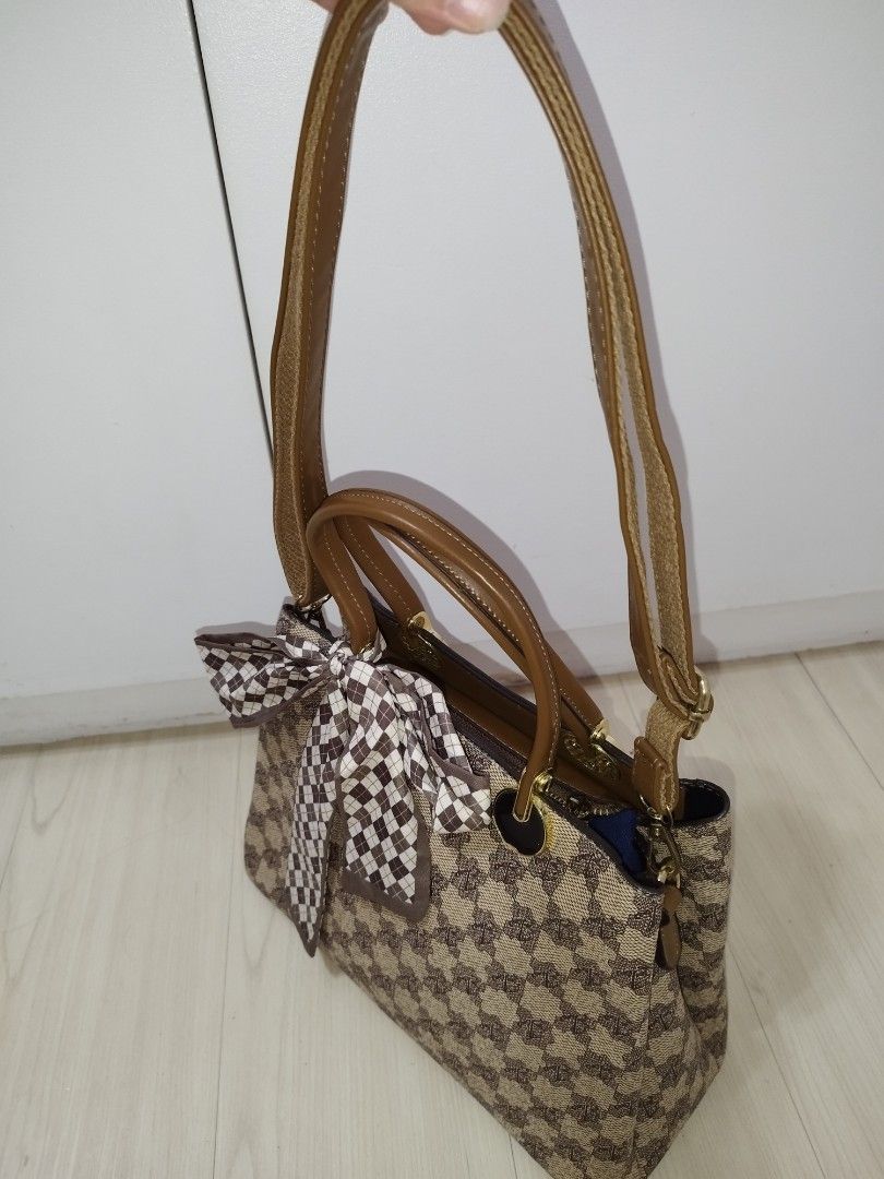 Mini Sling Bag (Category: Cross-body Bags) located in Makati City. Submitted by krishtyle (Listing ID 1468141068, Image 2). Description: Decluttering Personal Items Belladonna mini sling Bag (local brand) never been used. good as new can be used as handbag, shoulder bag or cross-body bag 📍Makati.
