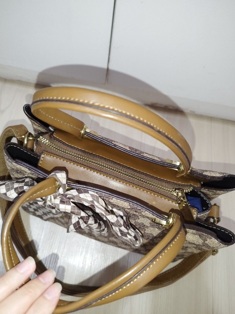 Mini Sling Bag (Category: Cross-body Bags) located in Makati City. Submitted by krishtyle (Listing ID 1468141068, Image 3). Description: Decluttering Personal Items Belladonna mini sling Bag (local brand) never been used. good as new can be used as handbag, shoulder bag or cross-body bag 📍Makati.