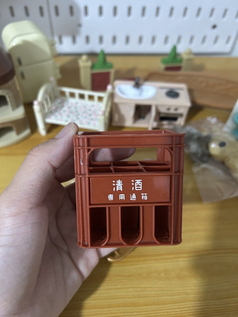 Miniature Japanese Sake Crate Plastic Model Toy (Category: Vintage Collectibles) located in Pateros City. Submitted by cleanmycloset (Listing ID 1468201486, Image 1). Description: Preloved, unless stated brandnew. All items are declared AS IS. Pls manage your expectations. Can do tiiktokk checkout, courier apps, or self pick up. Payment first thru cashg or bank transfer. Coin is used for size comparison. Follow me on toktikk @cleanmyclosetph .