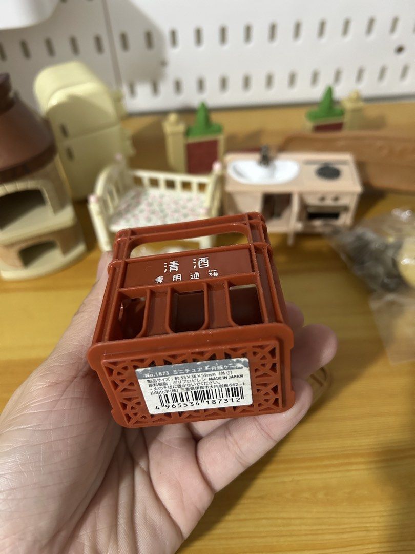 Miniature Japanese Sake Crate Plastic Model Toy (Category: Vintage Collectibles) located in Pateros City. Submitted by cleanmycloset (Listing ID 1468201486, Image 3). Description: Preloved, unless stated brandnew. All items are declared AS IS. Pls manage your expectations. Can do tiiktokk checkout, courier apps, or self pick up. Payment first thru cashg or bank transfer. Coin is used for size comparison. Follow me on toktikk @cleanmyclosetph .