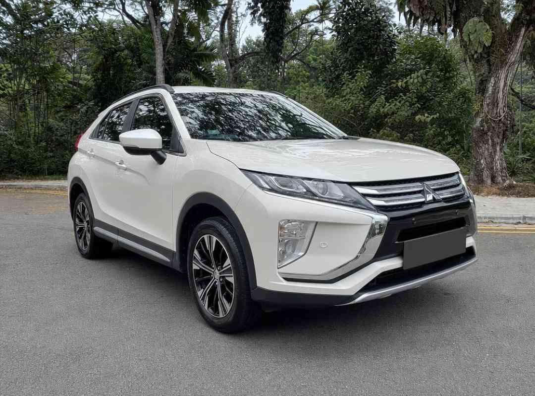 Mitsubishi Eclipse Cross 1.5T Classic (A) (Category: Used Cars) located in Singapore. Submitted by carousell_certified_partners (Listing ID 1464180421, Image 1). Description: 1 owner unit! 100% accident free! Tip top codition! No need any repair! All trade in welcome! Bank/in house loan available with attractive interest rate! Call our sales consultant to know more info or book an appointment for viewing today! Features: Powerful 1.5l MIVEC turbo