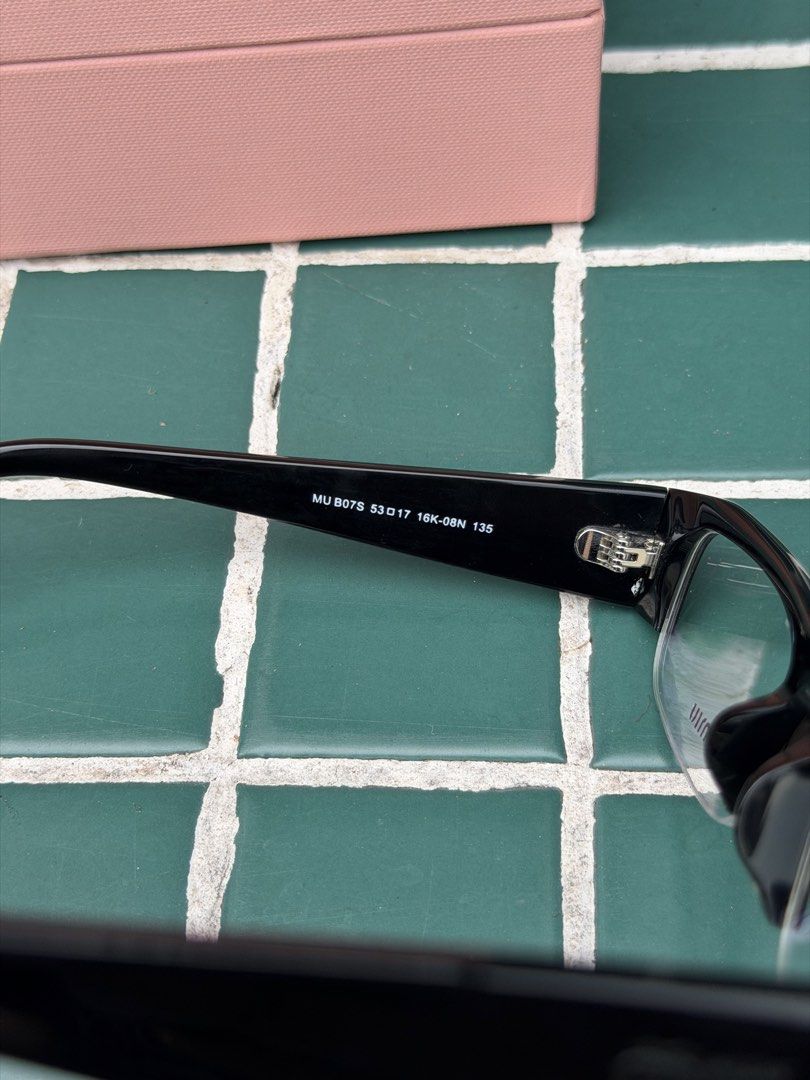MIU MIU (Category: Luxury Accessories) located in Angeles City. Submitted by secondluxph (Listing ID 1468188907, Image 3). Description: -MIUMIU VEDETTE SUNGLASSES IN BLACK -SMUBO7 -Bold black Frame and transparent lense -PRISTINE CONDITION -COMPLETE INCLUSIONS BOX, CASE, MICROFIBER CLOTH -JAPAN/HONGKONG SOURCE .