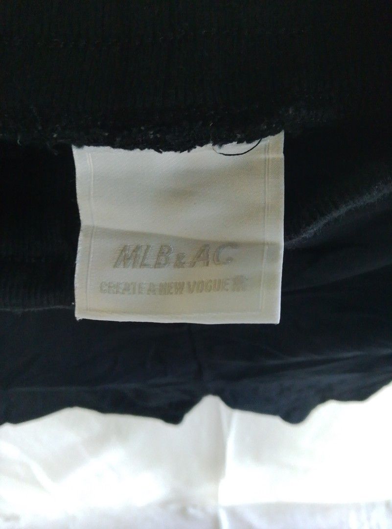 MLB & AC Black Yankees Shorts (Category: Shorts) located in Tayum. Submitted by purephoenix.0f7166 (Listing ID 1468065911, Image 3). Description: - Brand: MLB & AC - 30" - 34" waistline - 20" length - like new condition no issue - Color: Black with large New York Yankees logo on the left leg - Material: Soft and comfortable fabric - Fit & Size: Elastic waistband, 16 inches flat across waist, 17 inches length - Features: Convenient side pockets an