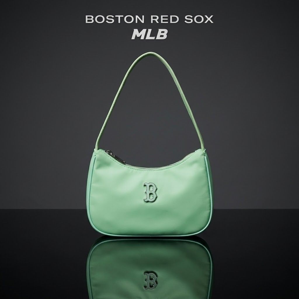 MLB Boston Red Sox Green Nylon Shoulder Bag (Category: Shoulder Bags) located in Carmen. Submitted by ar_thrift00 (Listing ID 1468282655, Image 1). Description: - MLB Boston Red Sox shoulder bag - Vibrant green nylon material with silver 'B' logo - Compact single-strap design for daily use - Custom branded zipper pullers - Green fabric-lined interior with a secure zipper pocket - Official MLB woven patch inside - Style number: 3AB0S032N - Conditi