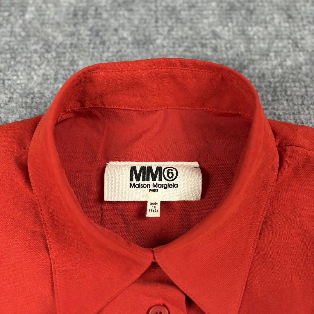 MM6 Maison Margiela Red Assymetrical Top (Category: Luxury Apparel) located in Manila. Submitted by yourtherapist_ (Listing ID 1468248600, Image 3). Description: MM6 Maison Margiela Red Assymetrical Top Size: 42 Condition: Good Flaw: Black dot spots Made in: Italy Measurements Width: 24 Length: 48 Shoulder: 23 2,000.