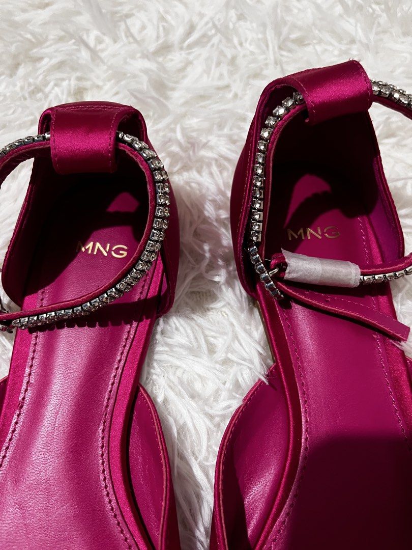 MNG Rhinestone Strap Satin Pointed Flats Fuchsia (Category: Flats & Sandals) located in Caloocan City. Submitted by clscloset.621 (Listing ID 1468232871, Image 2). Description: MNG pointed toe flats in bright fuchsia satin. Sparkling rhinestone ankle strap with buckle closure. Low heel design. Size 36 marked on sole. Plastic film still attached to the bottom of one sole, protective wrapping on the strap hardware. Never worn out..