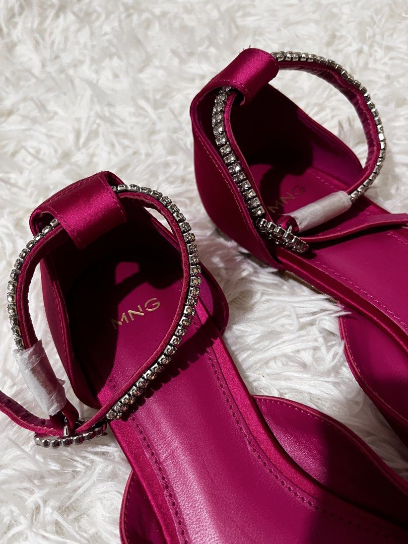 MNG Rhinestone Strap Satin Pointed Flats Fuchsia (Category: Flats & Sandals) located in Caloocan City. Submitted by clscloset.621 (Listing ID 1468232871, Image 3). Description: MNG pointed toe flats in bright fuchsia satin. Sparkling rhinestone ankle strap with buckle closure. Low heel design. Size 36 marked on sole. Plastic film still attached to the bottom of one sole, protective wrapping on the strap hardware. Never worn out..