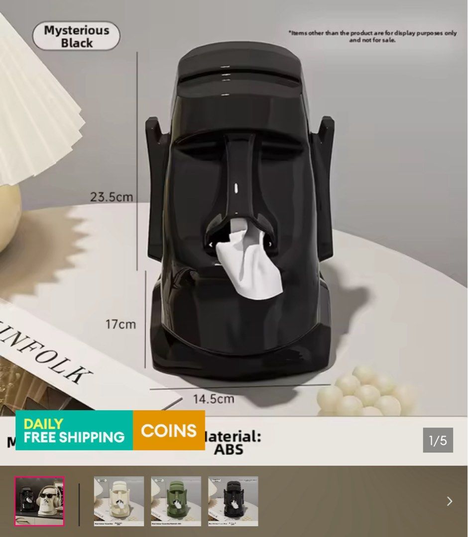 Moai Statue Tissue Box Holder Black (Category: Vintage Collectibles) located in Makati City. Submitted by declutter_forsale (Listing ID 1468074496, Image 1). Description: TISSUE BOX HOLDER - Fun and unique novelty design shaped like a Moai monolith head - Pulls tissues out comically through the open mouth - Crafted from sturdy, durable black glossy ABS plastic - Dimensions: Roughly 23.5cm (H) x 14.5cm (W) - Perfect conversation starter for your d