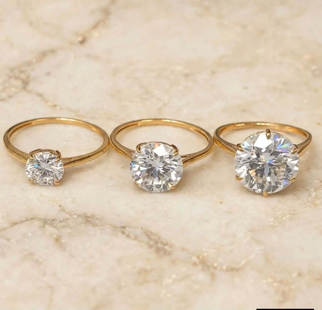 Moissanite Round Brilliant Cut 18K Solid Gold w/ GRA Certificate (Category: Rings) located in Malolos. Submitted by keenhorse_ef38ab (Listing ID 1468083518, Image 1). Description: Moissanite Round Brilliant Cut 18K Solid Gold w/ GRA Certificate VS1 Clarity - like Diamond Quality! ✔️PAWNABLE ✔️Solid for everyday use ✔️Passed in Diamond Tester Prices: 1ct - ₱11,990 (sizes: 7, 7.5, 8, 8.5 & 9) 3ct - ₱14,950 (sizes: 7, 7.5, & 8 ) 5ct - ₱22,600 (adjus