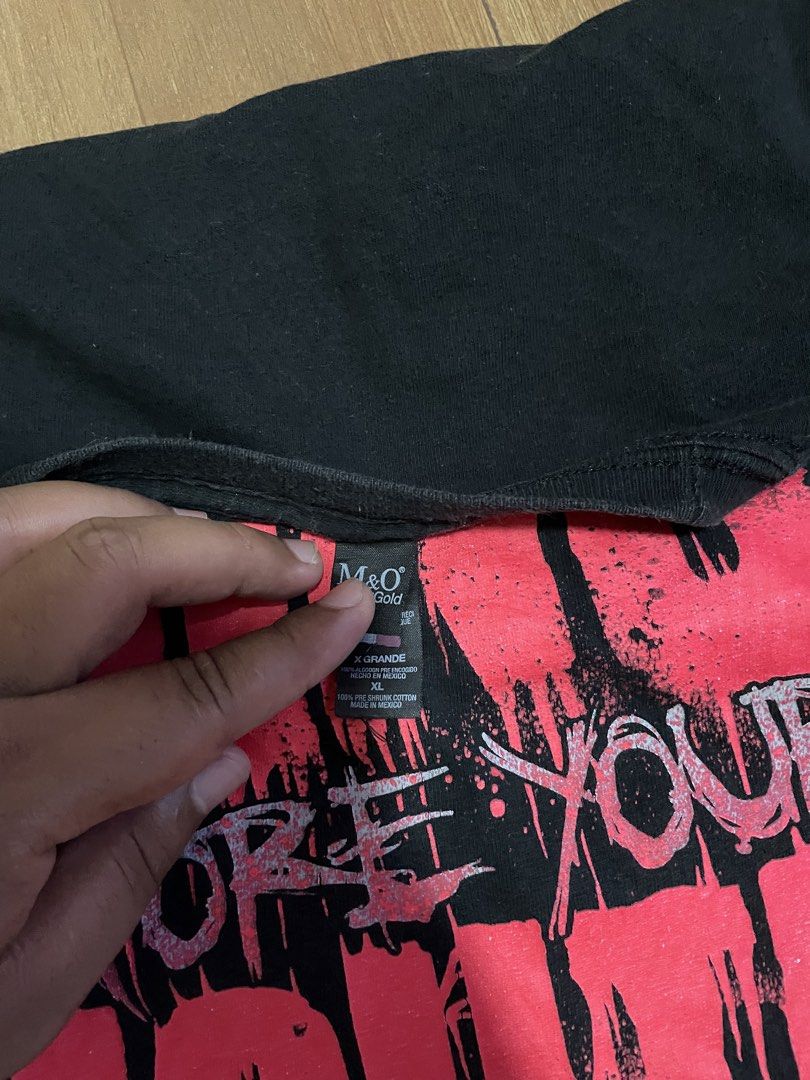 Motionless in White Open Your Mind Band Tee (Category: Tshirts & Polo Shirts ) located in Minalabac. Submitted by heatdosage (Listing ID 1468157466, Image 3). Description: - Band: Motionless in White - Design: 'Open Your Mind Before Your Mouth' large front graphic in red and white - Size: XL (Regular fit, short sleeves) - Material: 100% pre-shrunk cotton - Tag: M&O Gold tag - Condition: Minor fading from washing, no holes or stains 22x30.