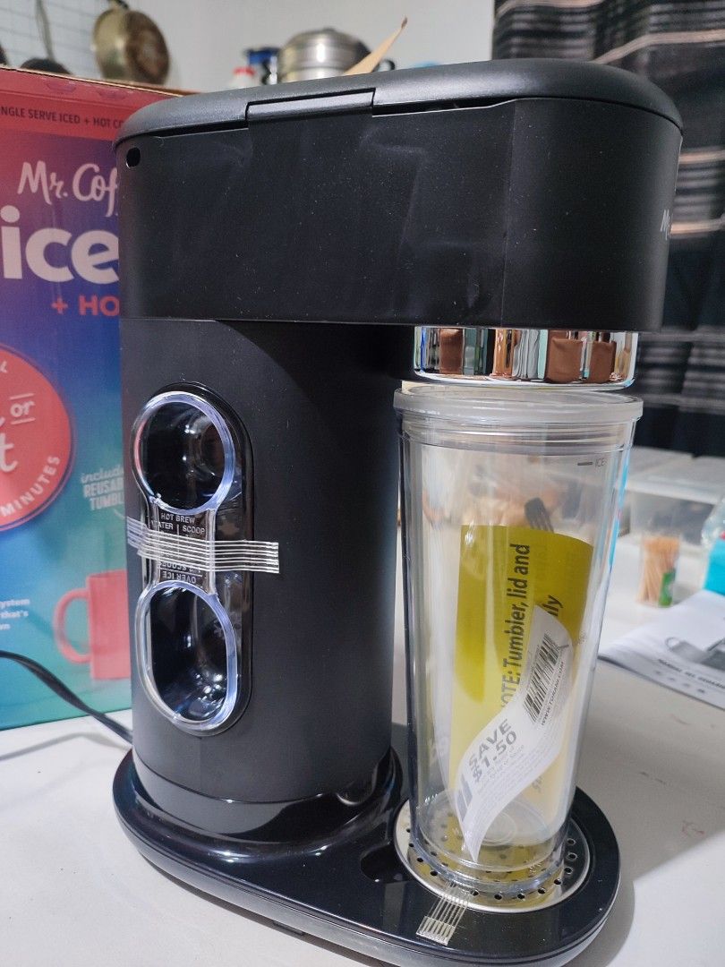 Mr. Coffee Iced and Hot Single Serve Coffee Maker (Category: Coffee Machines & Makers) located in Bacoor. Submitted by almfl (Listing ID 1468175512, Image 3). Description: - Brand: Mr. Coffee - Color: Black - Condition: Brand new in original box with all original contents - Brews: Both hot and iced coffee in minutes - Pod-free: Uses your favorite coffee grounds with an easy measuring system - Eco-friendly extras: Includes a reusable tumbler and a