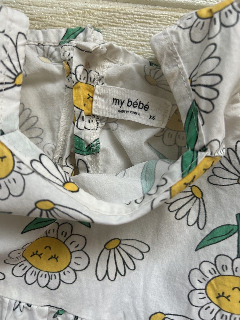 My bebe sunflower dress (Category: Babies & Kids Fashion) located in Cebu City. Submitted by yjainani (Listing ID 1468073624, Image 3). Description: summer dress features a square neckline, puff sleeves, a high-waisted cinched skirt, and an all-over cartoon sunflower pattern fits 3-4T.