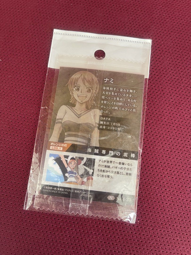 Nami (Category: Raw Singles) located in Manila. Submitted by dstrangerthings (Listing ID 1468233678, Image 2). Description: - Authentic Bandai One Piece Trading Card Game featuring Nami - Features stunning Nami artwork with Japanese text and the Straw Hat Pirates skull logo - 100% Made in Japan - Perfect for One Piece TCG players and Nami collectors!.